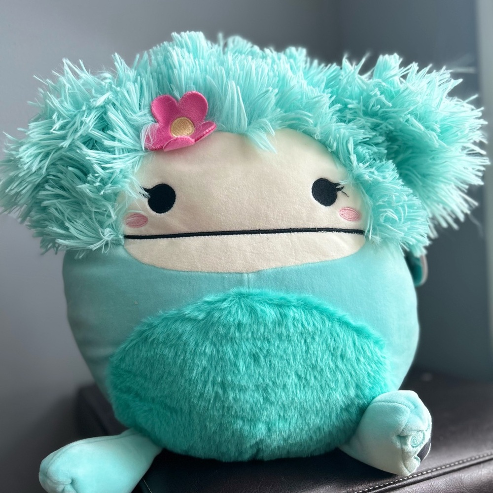 Squishmallows Bigfoot Blue Plush Toy - Joelle 12” with Pink Flower